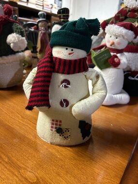 Festive Cream Snowman Figurine with Green Hat and Red-Black Scarf